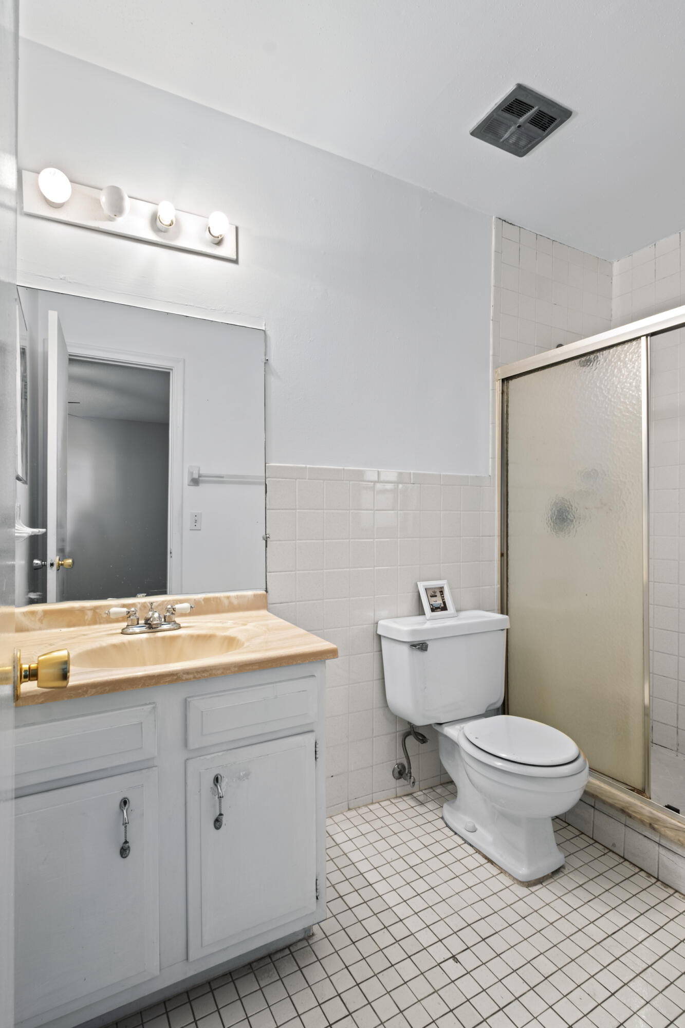 825 Northwest 13th Street, Unit 223 Boca Raton, FL 33486 - Photo 27 of 42 a spacious bathroom with a sink toilet and shower
