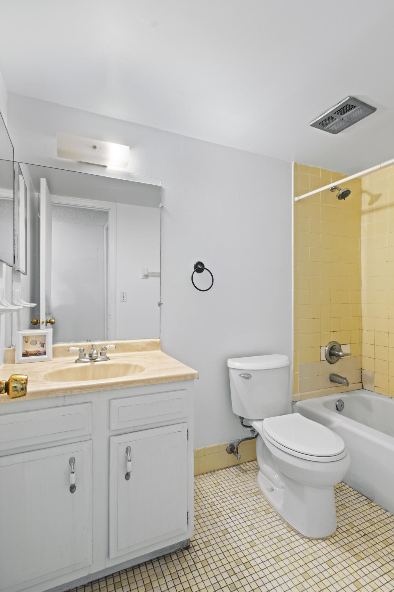 825 Northwest 13th Street, Unit 223 Boca Raton, FL 33486 - Photo 28 of 42 a spacious bathroom with a sink a toilet a mirror and shower