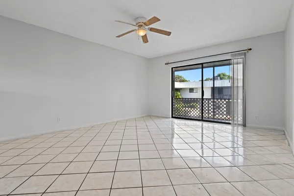 a view of an empty room and window