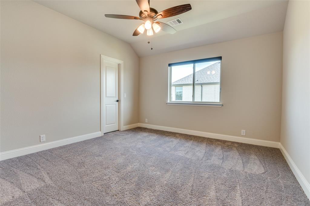 4810 Nomad Drive Midlothian, TX 76065 - Photo 28 of 39 an empty room with windows and fan