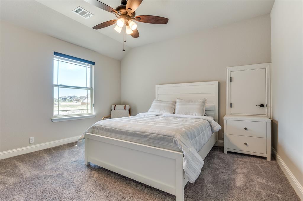 4810 Nomad Drive Midlothian, TX 76065 - Photo 29 of 39 a bedroom with a bed and a window