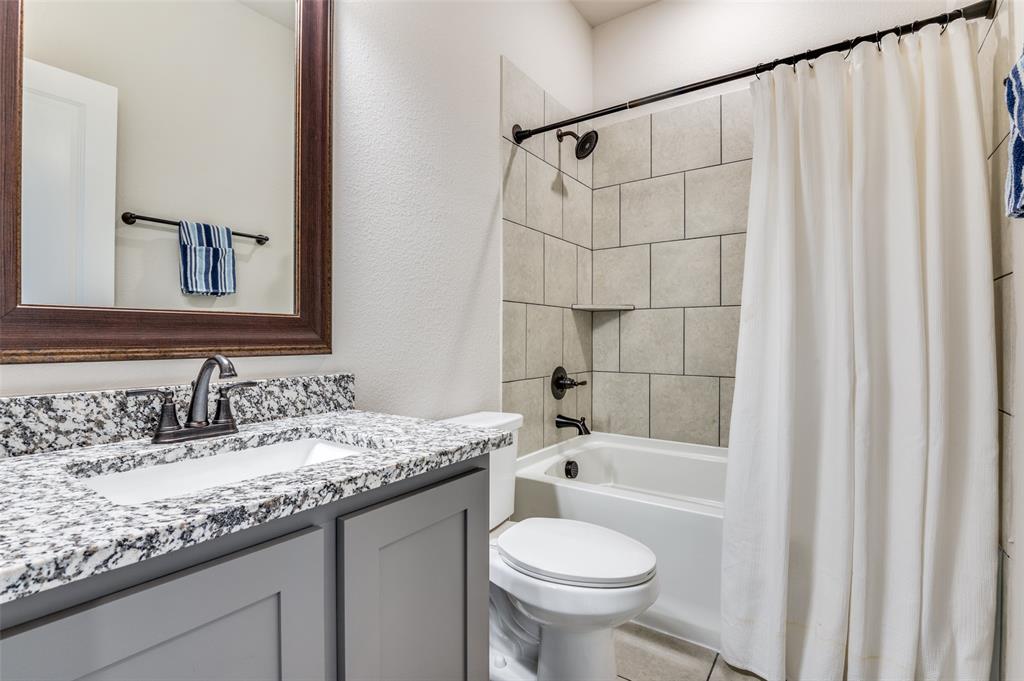 4810 Nomad Drive Midlothian, TX 76065 - Photo 30 of 39 a bathroom with a sink toilet and shower