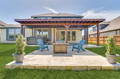 a view of a porch with seating space