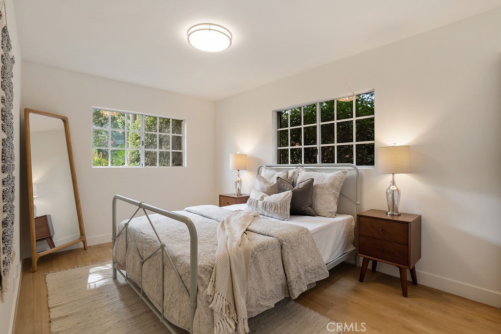 235 Spinks Canyon Road Duarte, CA 91010 - Photo 26 of 62 a bedroom with a bed and a window
