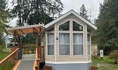 24443 Wicker Road, Unit 15 Sedro-Woolley, WA 98284 - Photo 5 of 6 a house view with a outdoor space