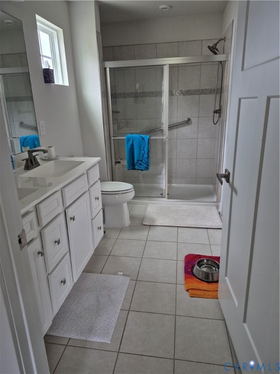 7430 East Danube Loop New Kent, VA 23124 - Photo 17 of 27 a bathroom with a sink and a shower