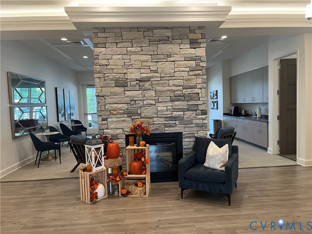 7430 East Danube Loop New Kent, VA 23124 - Photo 20 of 27 Great room of Clubhouse featuring Fireplace.