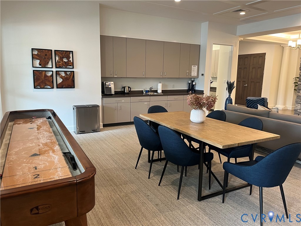 7430 East Danube Loop New Kent, VA 23124 - Photo 24 of 27 Dining Area & Shuffle Board Table in Clubhouse