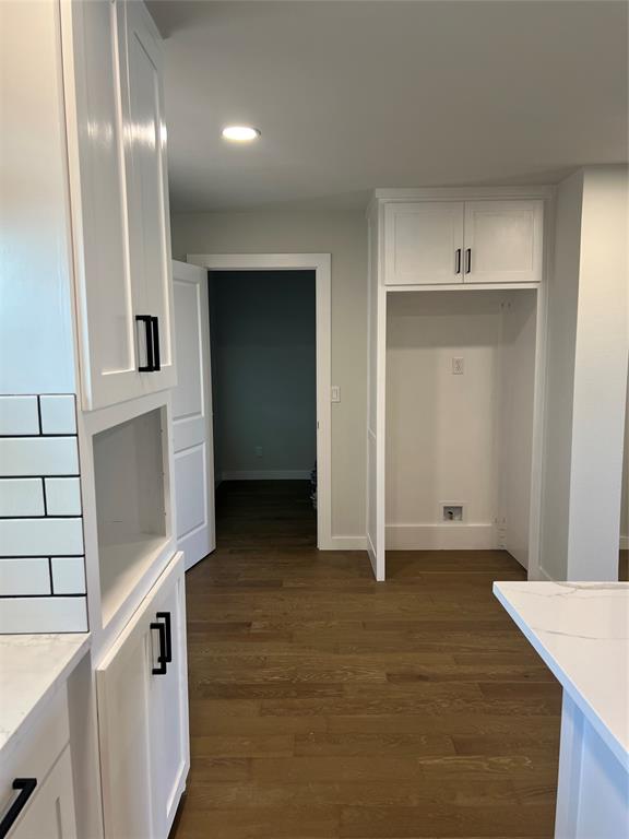 526 Jack Grace Hill Road Bowie, TX 76230 - Photo 22 of 34 a view of an empty room with wooden floor