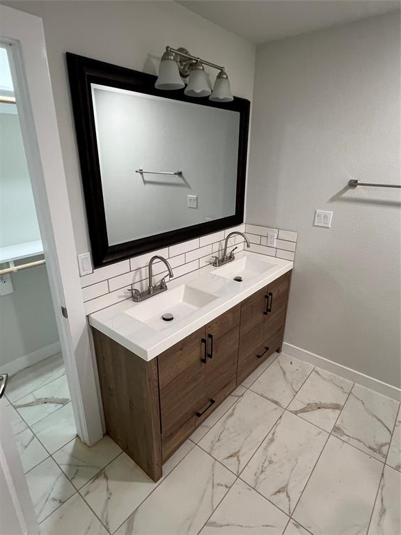 526 Jack Grace Hill Road Bowie, TX 76230 - Photo 10 of 34 a utility room with a sink washer and dryer