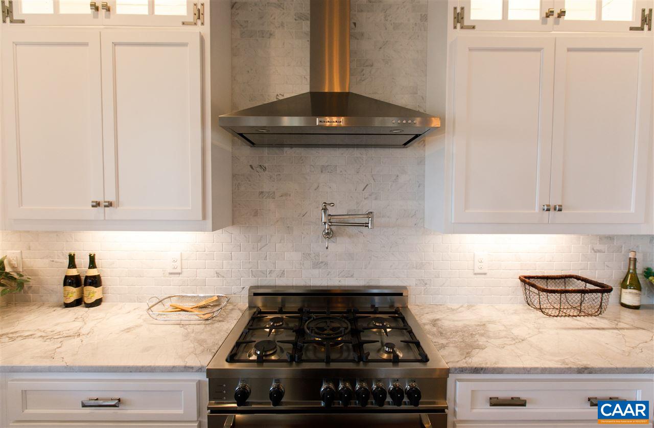 2412 Summit Ridge Trail Charlottesville, VA 22911 - Photo 13 of 41 a stove top oven sitting inside of a kitchen
