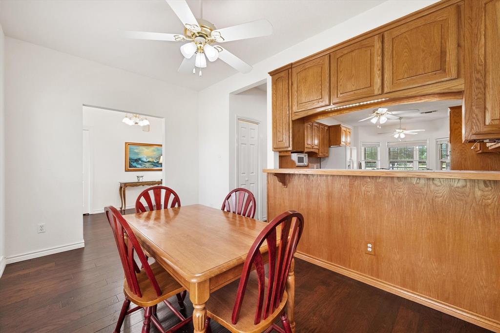 13021 Rudy's Way Streetman, TX 75859 - Photo 5 of 40 Open dining area in Streetman, TX with easy flow to the kitchen and living spaces.