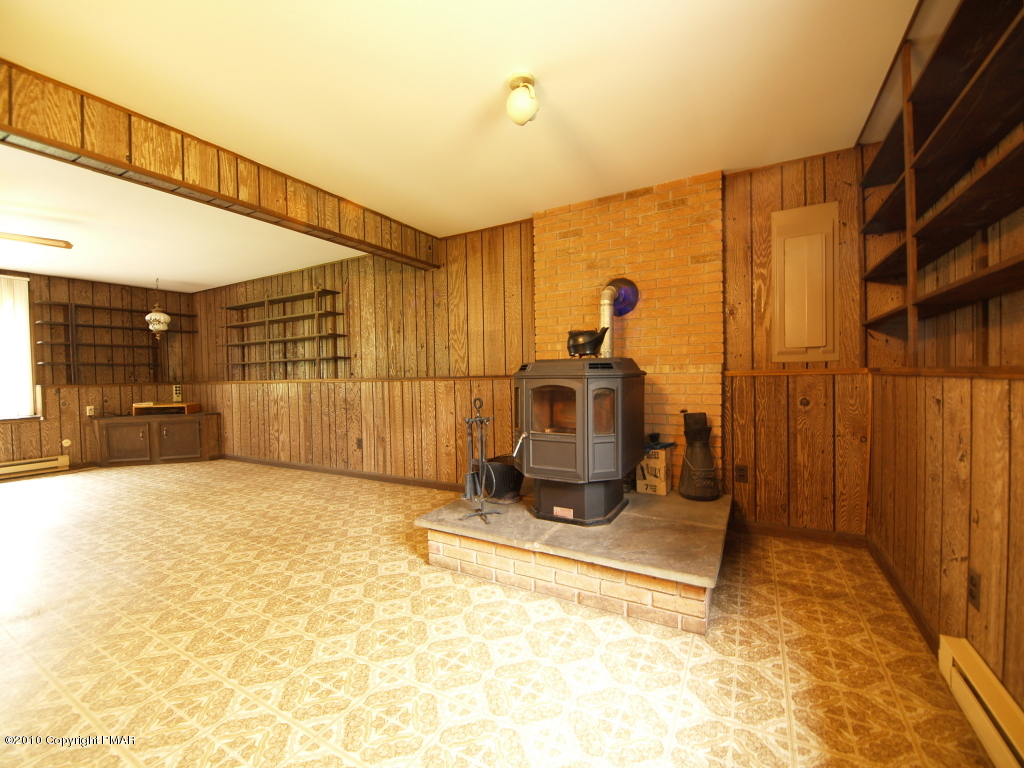28 D Balson Road Stroudsburg, PA 18360 - Photo 8 of 19 Family room pellet stove