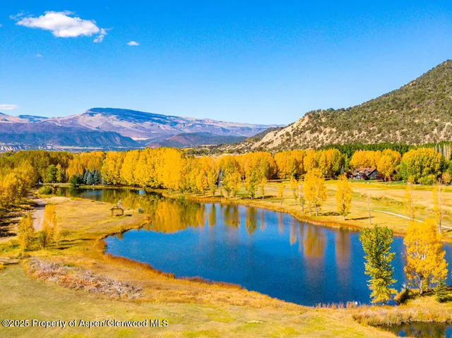 a view of a lake with a mountain