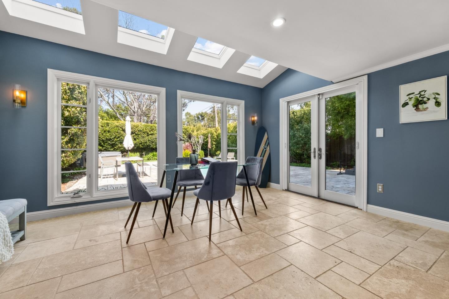 1536 Eastmoor Road Burlingame, CA 94010 - Photo 24 of 70 a dining room with furniture and large windows