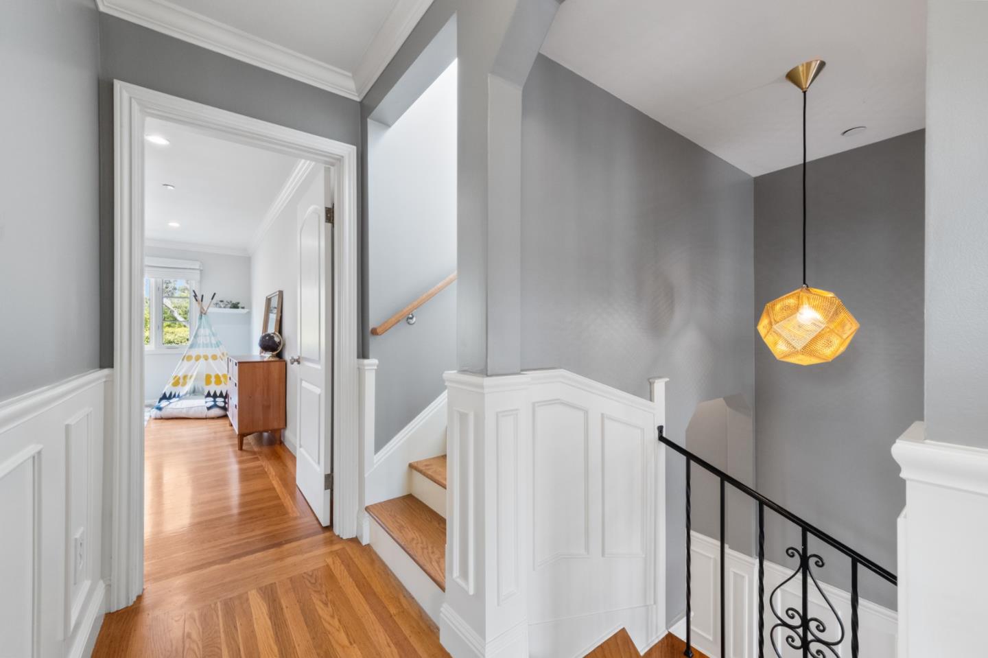 1536 Eastmoor Road Burlingame, CA 94010 - Photo 28 of 70 a view of a hallway view with wooden floor and staircase