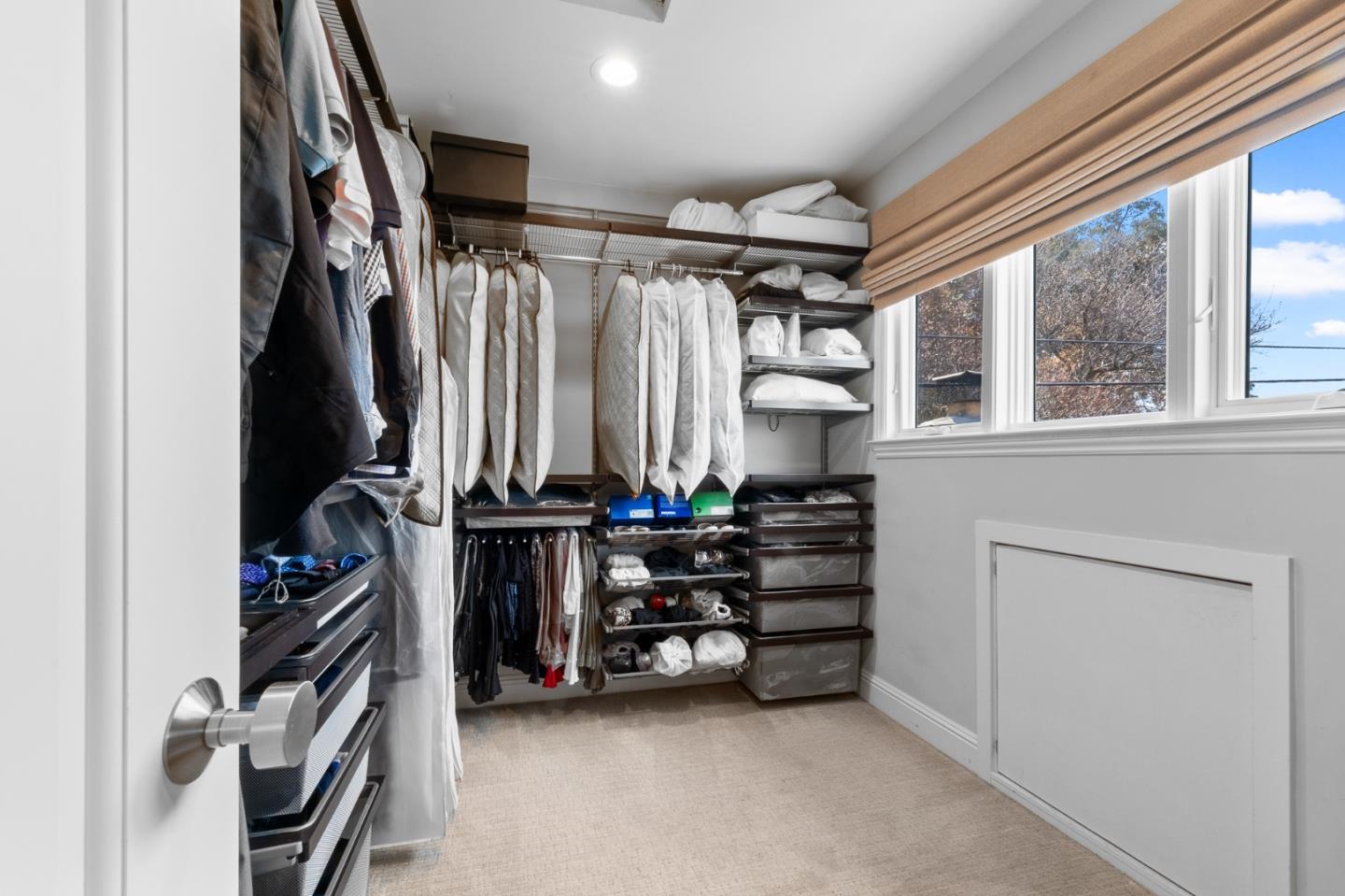 1536 Eastmoor Road Burlingame, CA 94010 - Photo 40 of 70 a view of walk in closet with clothes and shoes