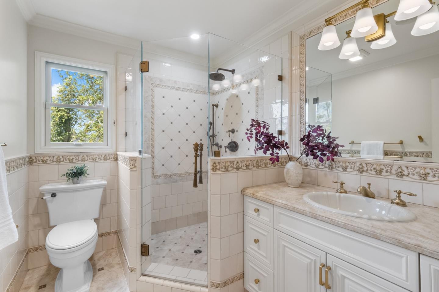 1536 Eastmoor Road Burlingame, CA 94010 - Photo 47 of 70 a bathroom with a granite countertop sink toilet and shower
