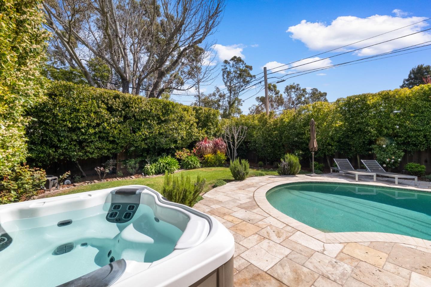 1536 Eastmoor Road Burlingame, CA 94010 - Photo 60 of 70 a view of backyard with swimming pool and outdoor seating