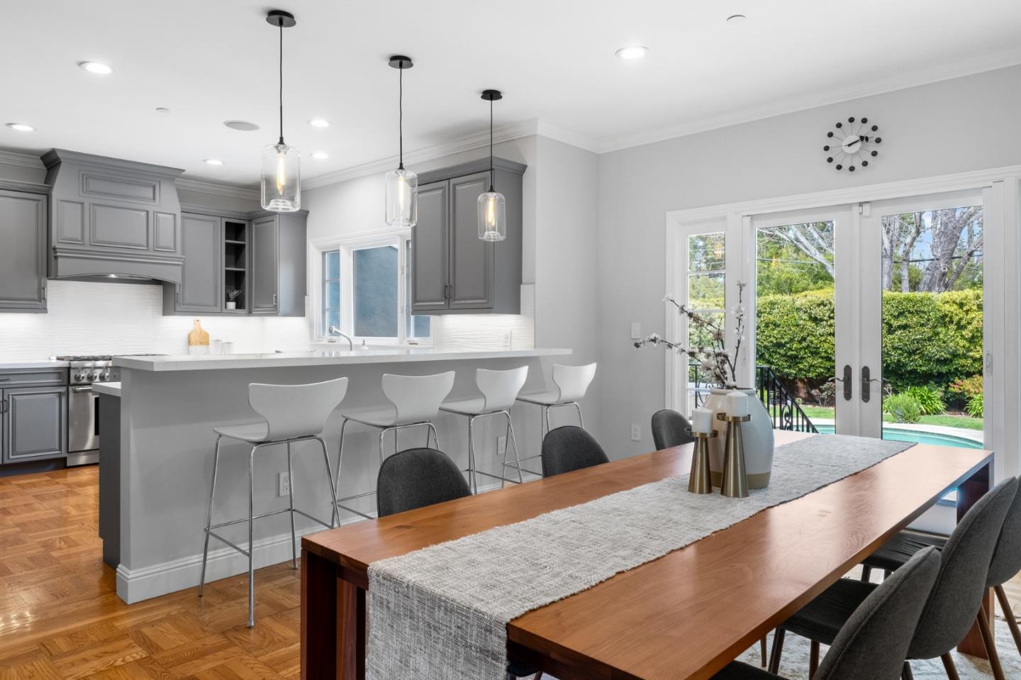 1536 Eastmoor Road Burlingame, CA 94010 - Photo 9 of 70 a dining table with chairs and a large window