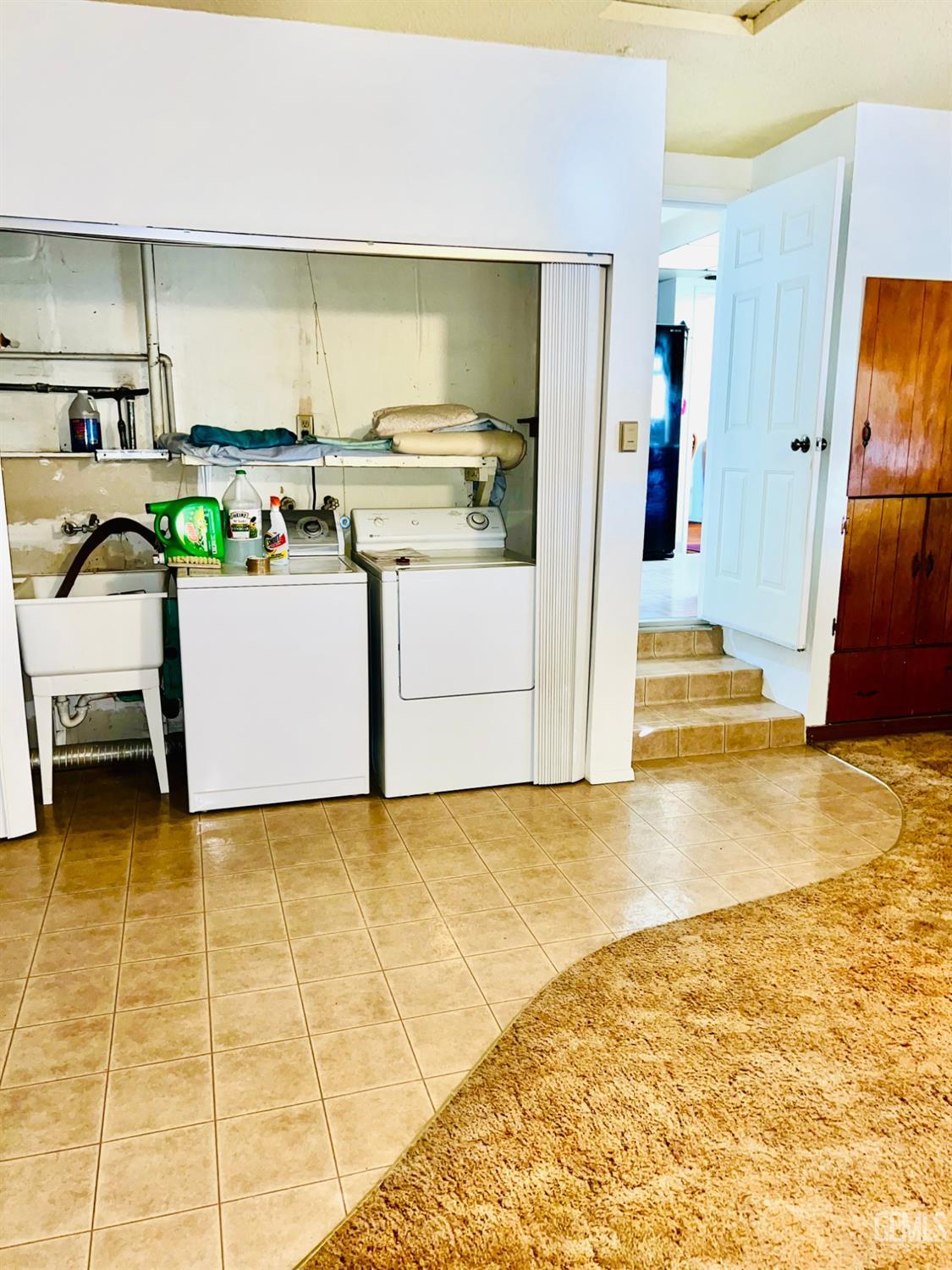 Undisclosed Address Bakersfield, CA 93305 - Photo 13 of 22 a view of kitchen with stainless steel appliances kitchen island granite countertop a sink and cabinets
