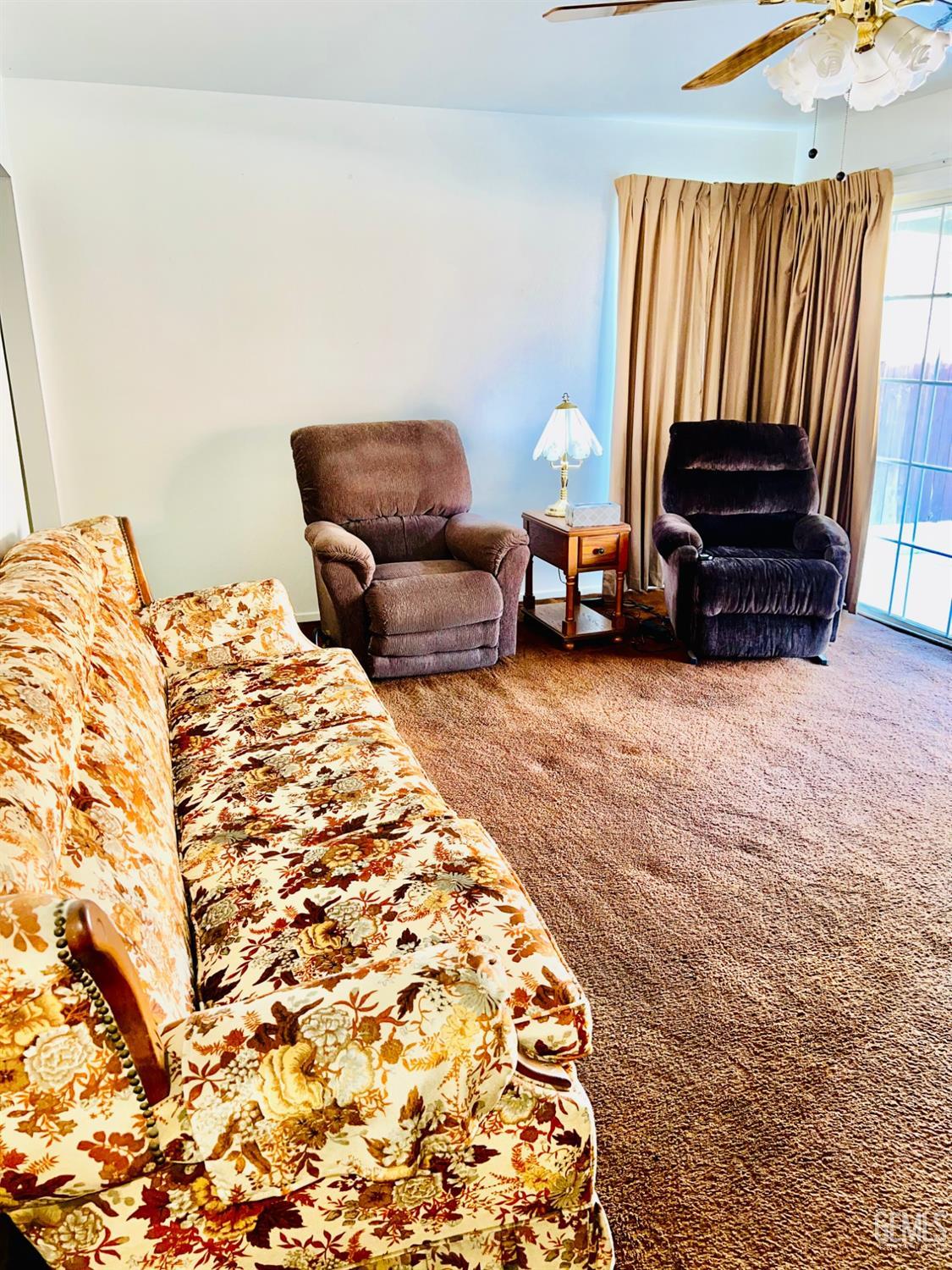 Undisclosed Address Bakersfield, CA 93305 - Photo 4 of 22 a bedroom with furniture and a window