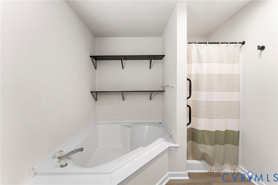 1146 Indian Valley Road Heathsville, VA 22473 - Photo 32 of 45 a bathroom with a bathtub