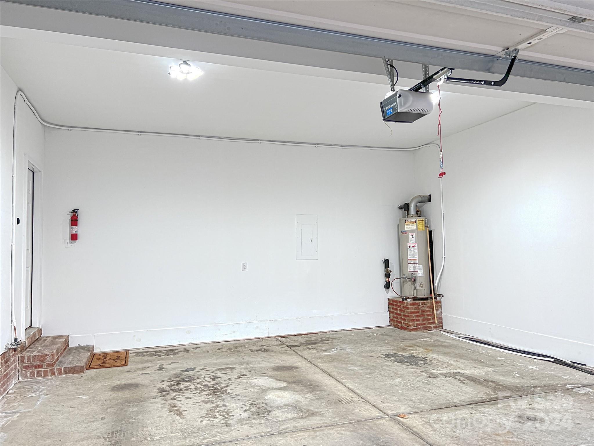 1644 Heather Glen Road Kannapolis, NC 28081 - Photo 24 of 25 a view of a livingroom with wooden floor and cabinets