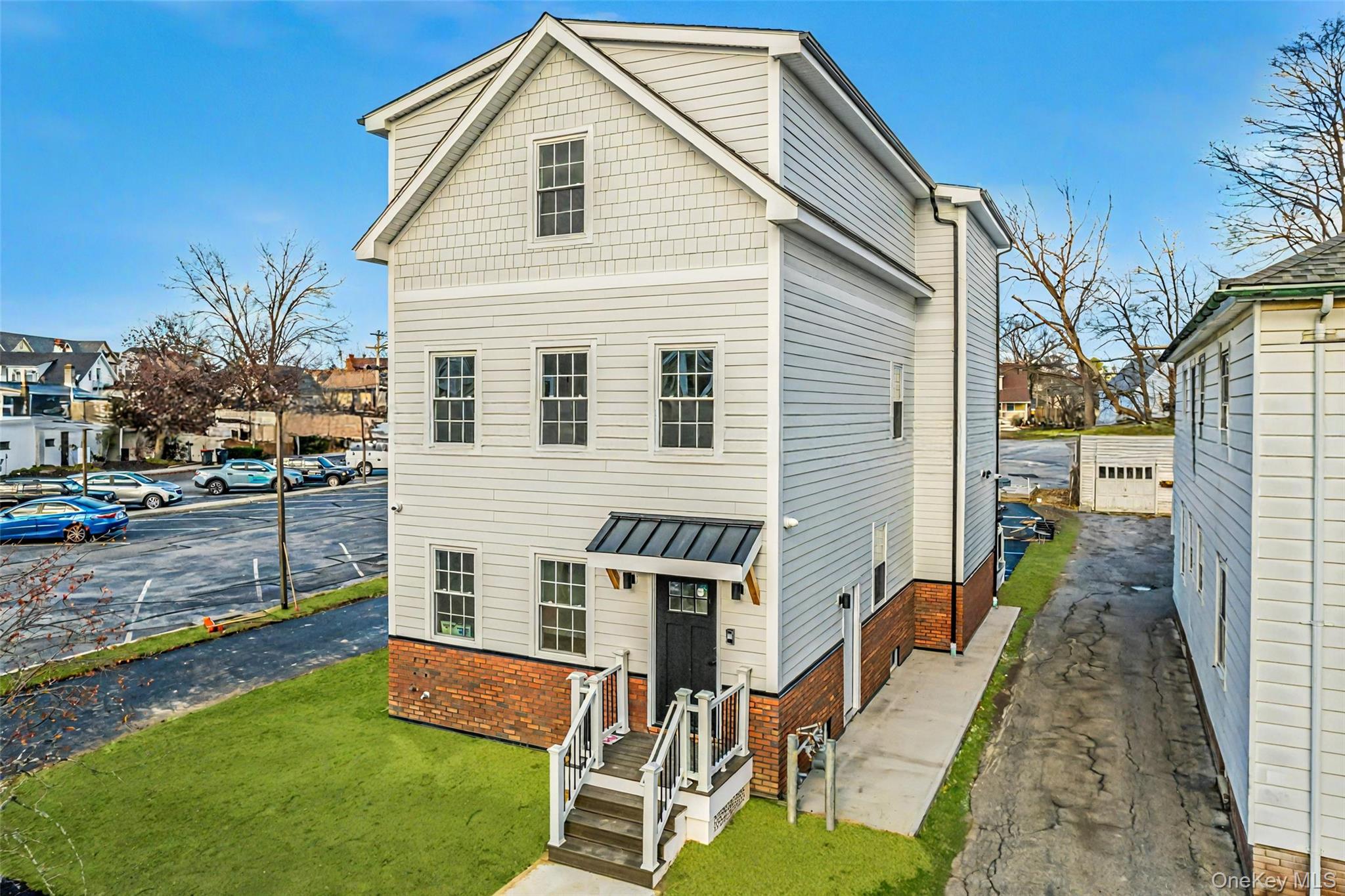 9 Lagrange Avenue, Unit 4 Poughkeepsie, NY 12603 - Photo 15 of 15 View of front facade featuring a front yard