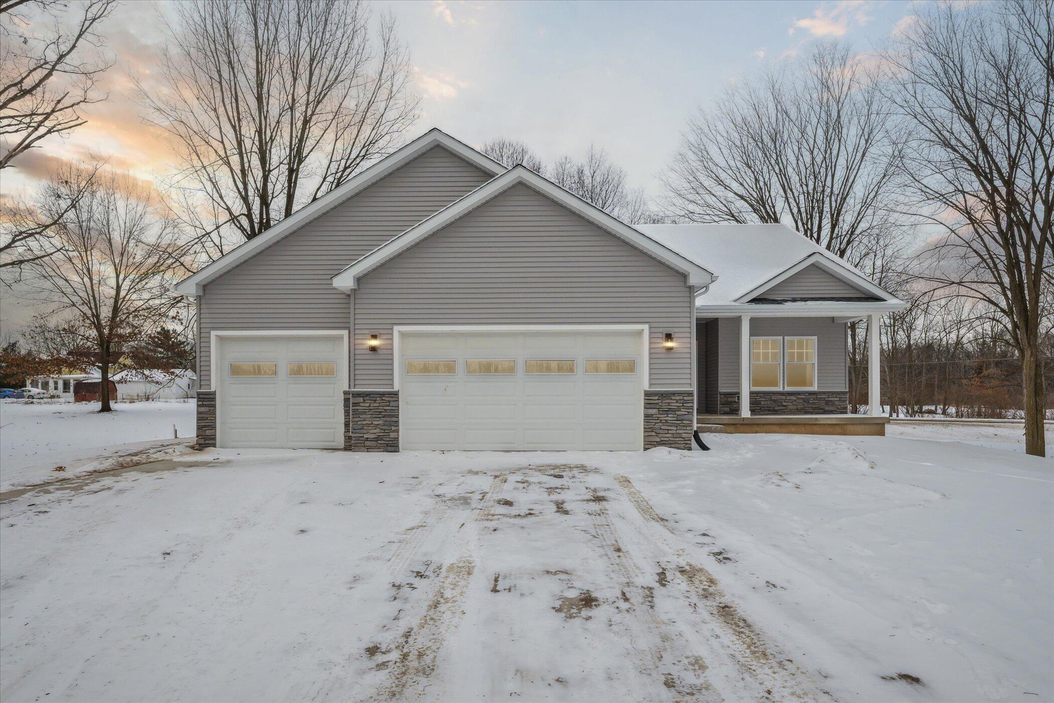 10025 Stoll Road Haslett, MI 48840 - Photo 1 of 41 01-10025-Stoll-Rd-East-Lansing-MI-48823