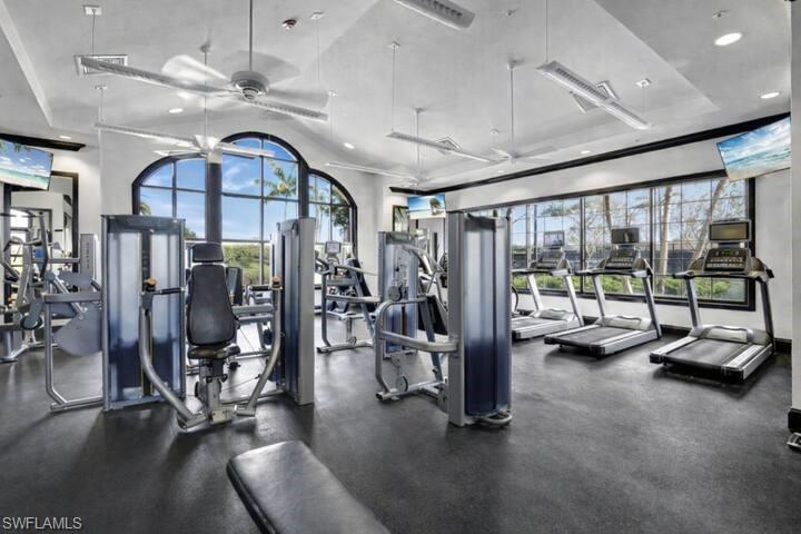 8191 Lucello Terrace North Naples, FL 34114 - Photo 30 of 42 a view of a room with gym equipment