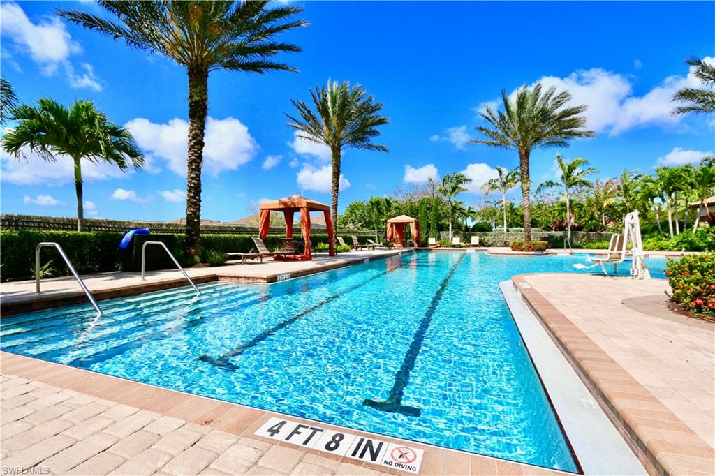 8191 Lucello Terrace North Naples, FL 34114 - Photo 34 of 42 a view of a yard with a patio