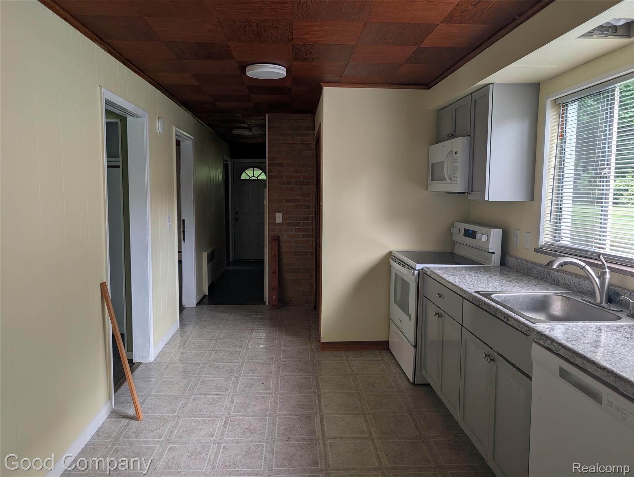 2924 Frankson Avenue, Unit 2 Rochester, MI 48307 - Photo 2 of 6 Kitchen featuring light gray cabinetry, a stainless steel sink, and light-colored countertops