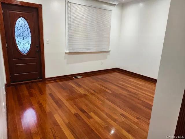 a view of a hallway with entryway