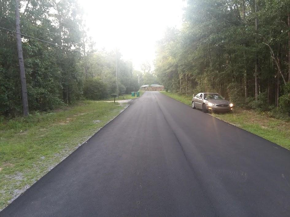 6254 Winstead Road Crestview, FL 32539 - Photo 2 of 5 a view of a road with a yard