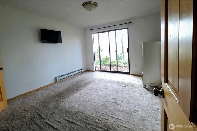 an empty room with windows