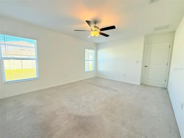 a view of a big room with wooden floor