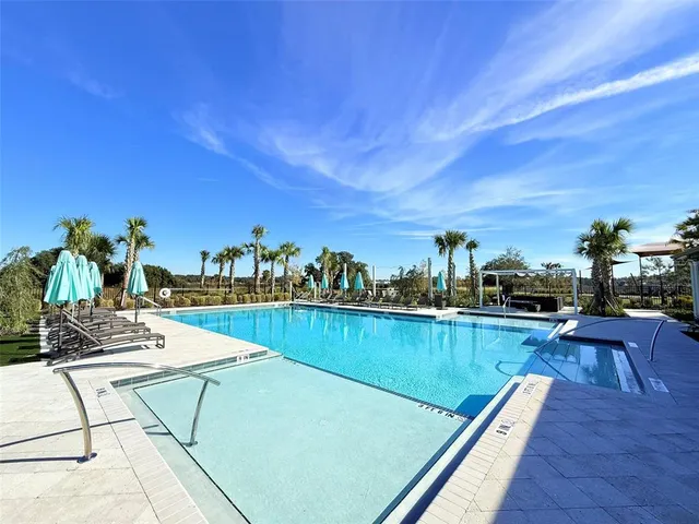 a view of a house with swimming pool