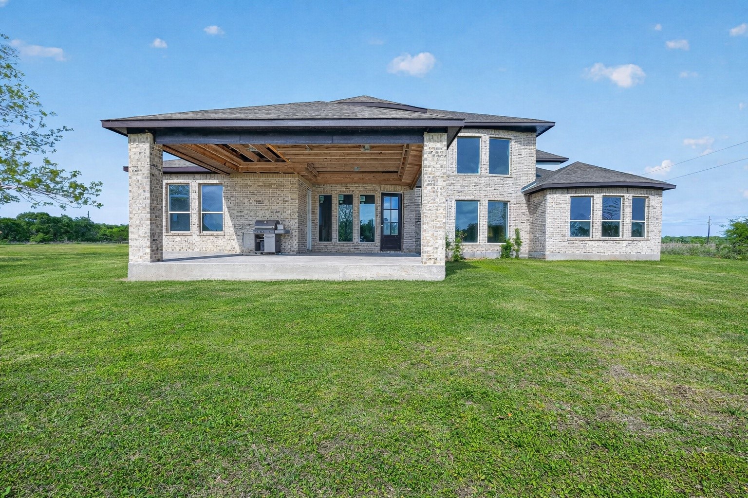 8023 Pool Hill Road Fulshear, TX 77441 - Photo 21 of 50 a front view of a house with a yard