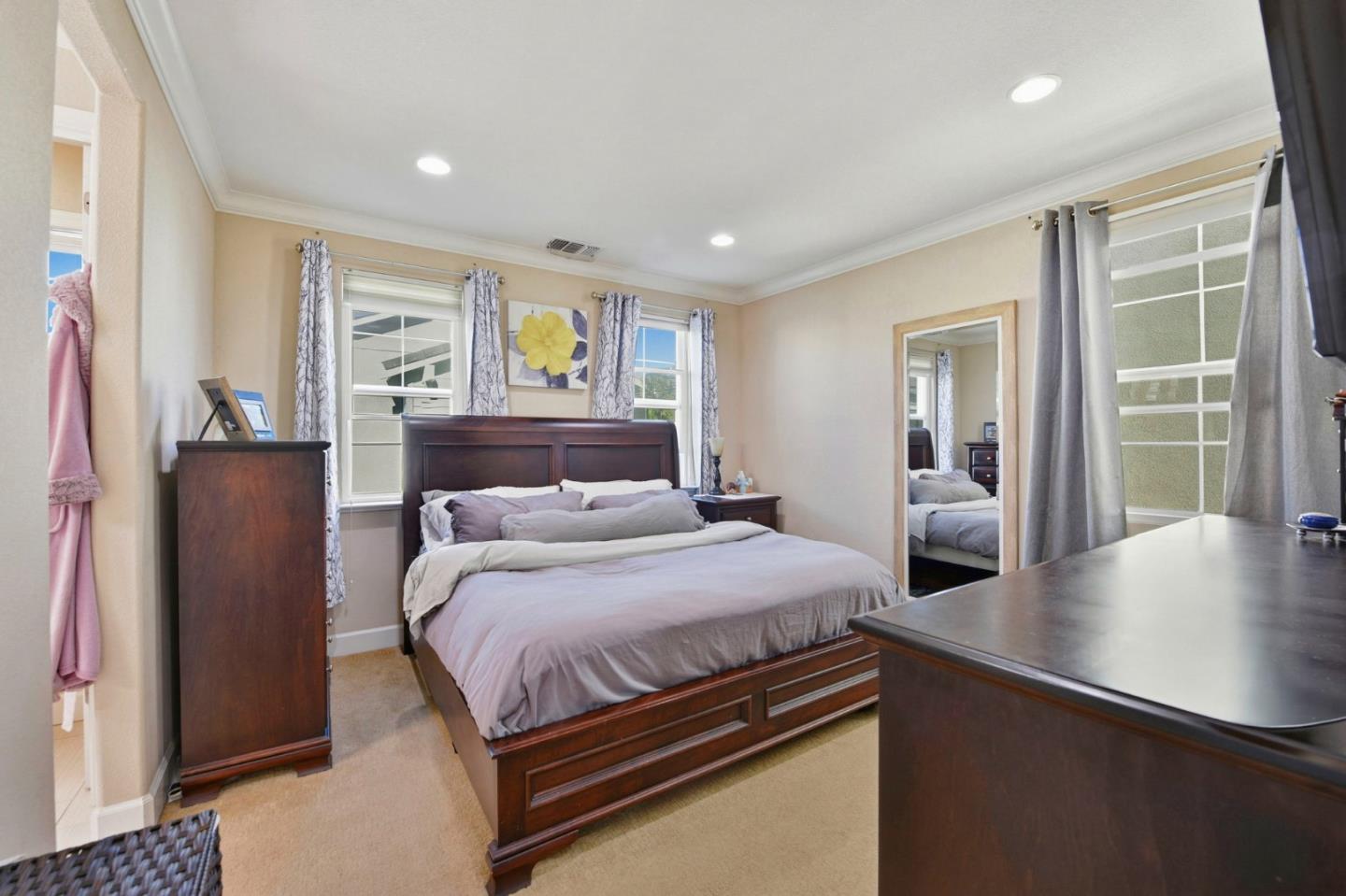 56 Regency Place Hayward, CA 94544 - Photo 19 of 43 a bedroom with a bed and wooden floor