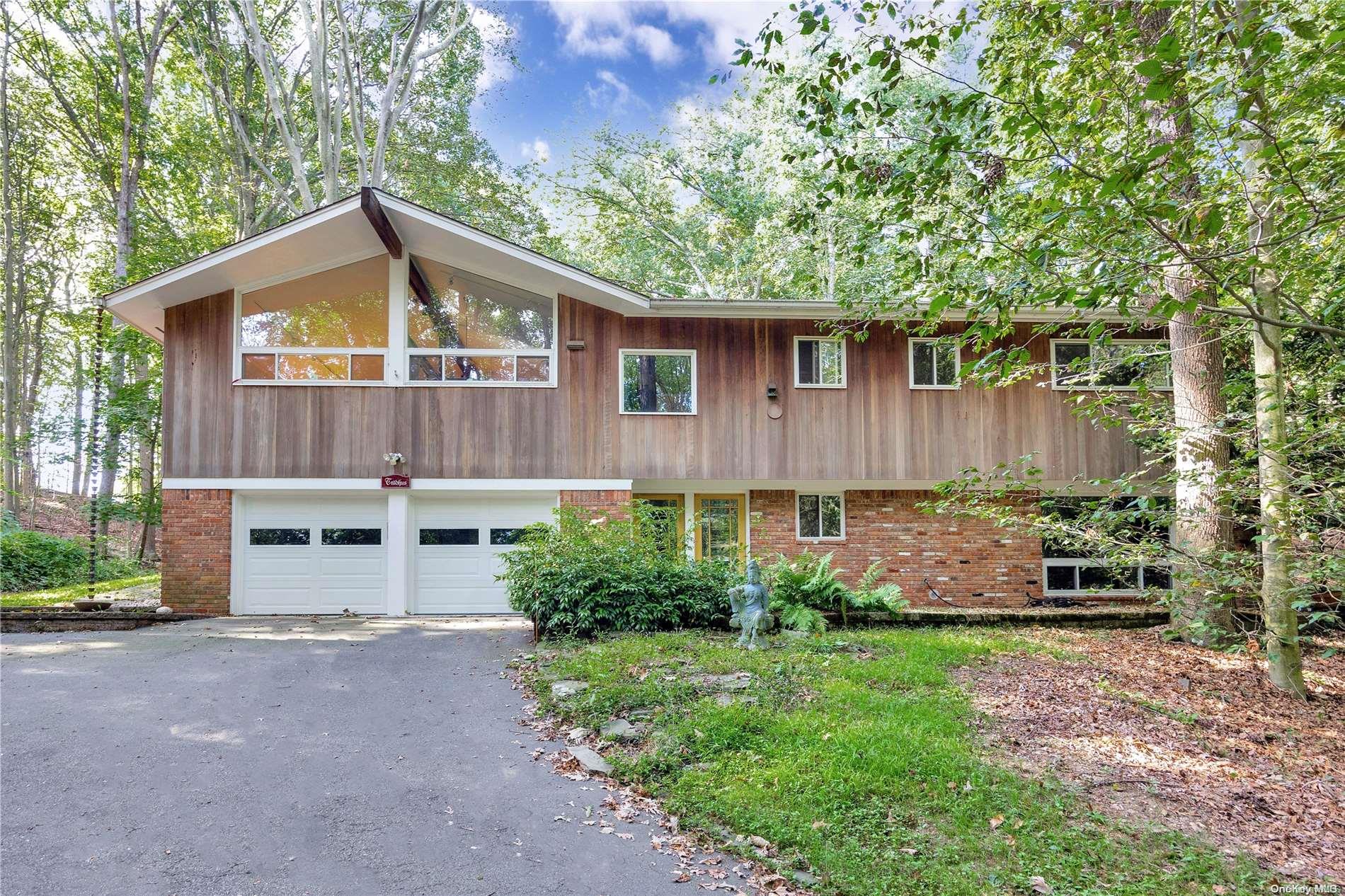116 Sea Cove Road Northport, NY 11768 - Photo 1 of 1 a view of a back yard of the house