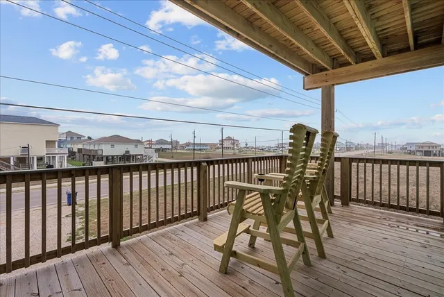 a view of balcony with furniture