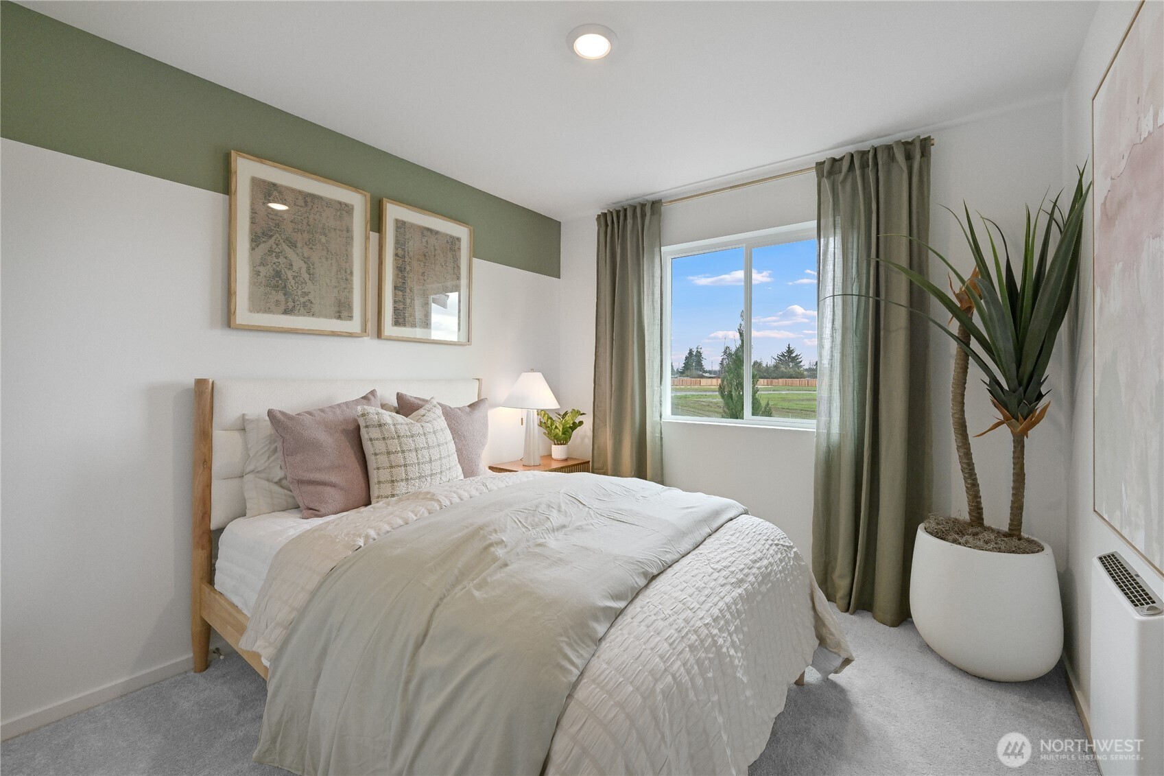 93 Moonshadow Lane Sequim, WA 98382 - Photo 19 of 22 a bedroom with bed and large window