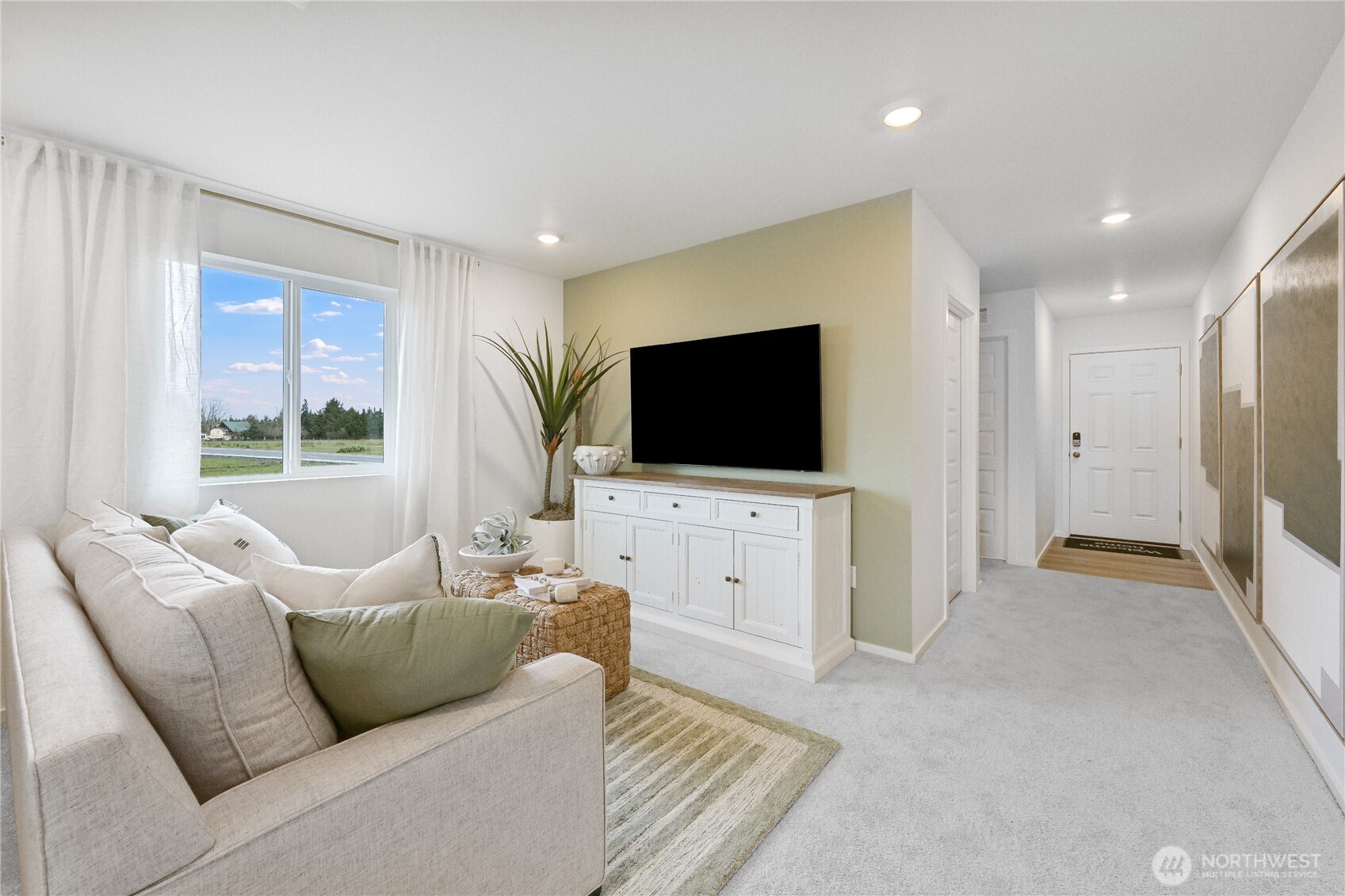 93 Moonshadow Lane Sequim, WA 98382 - Photo 10 of 22 a living room with furniture and a flat screen tv