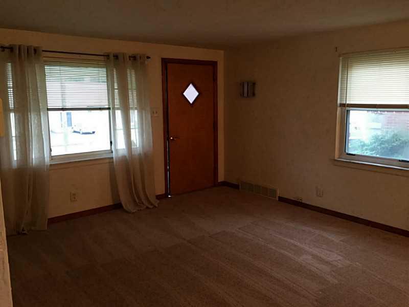 405 Agnew Road Jeannette, PA 15644 - Photo 4 of 11 Living Room. nice open living room and dining room