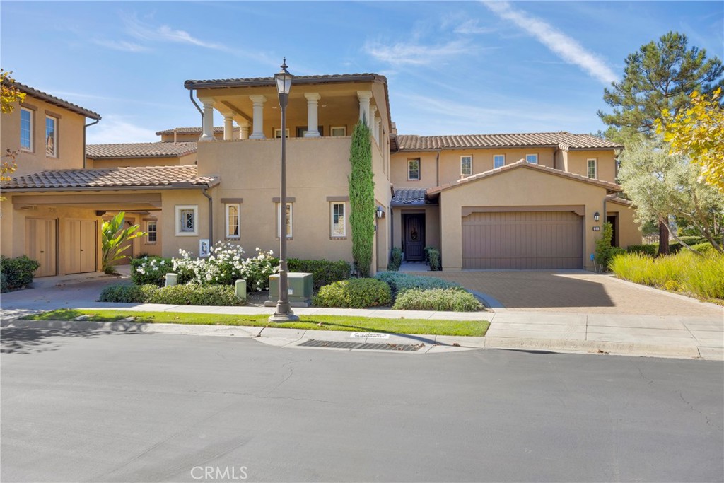 25 Tuscany Ladera Ranch, CA 92694 - Photo 1 of 1 a front view of house with yard and green space