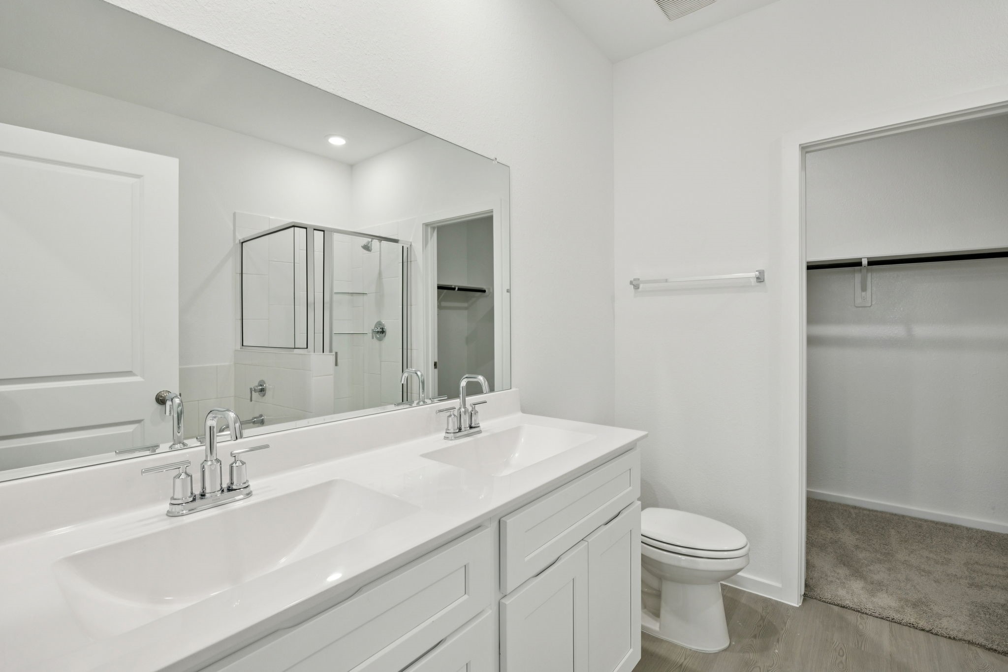 414 Point Nemo Street Crosby, TX 77532 - Photo 11 of 50 a bathroom with a toilet sink and mirror