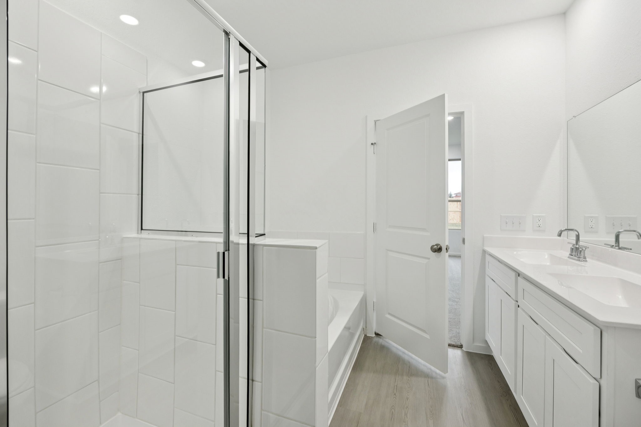 414 Point Nemo Street Crosby, TX 77532 - Photo 12 of 50 a bathroom with a shower and a sink