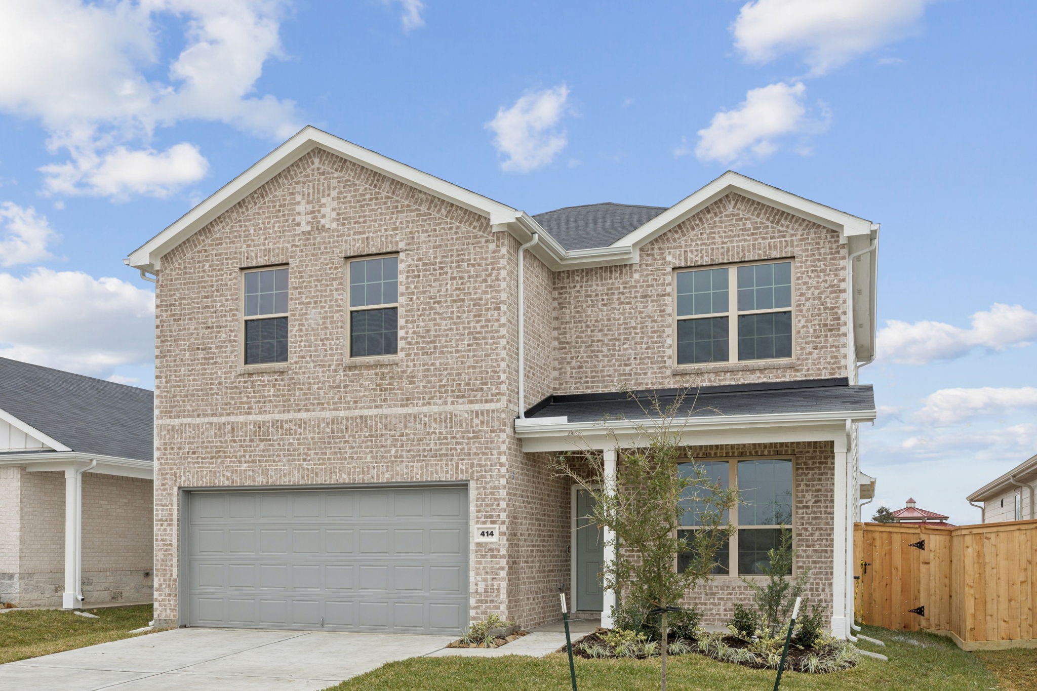 414 Point Nemo Street Crosby, TX 77532 - Photo 2 of 50 a front view of a house with a yard