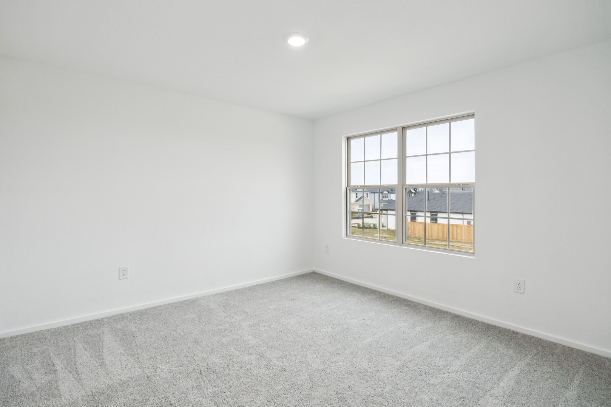 414 Point Nemo Street Crosby, TX 77532 - Photo 21 of 50 an empty room with a window